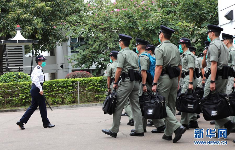 (港澳臺·香港故事·圖文互動)(3)警察抗疫專隊:我心依舊