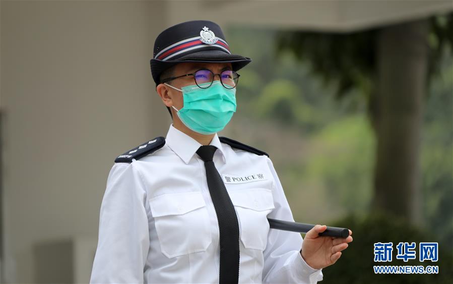 (港澳臺·香港故事·圖文互動)(2)警察抗疫專隊:我心依舊
